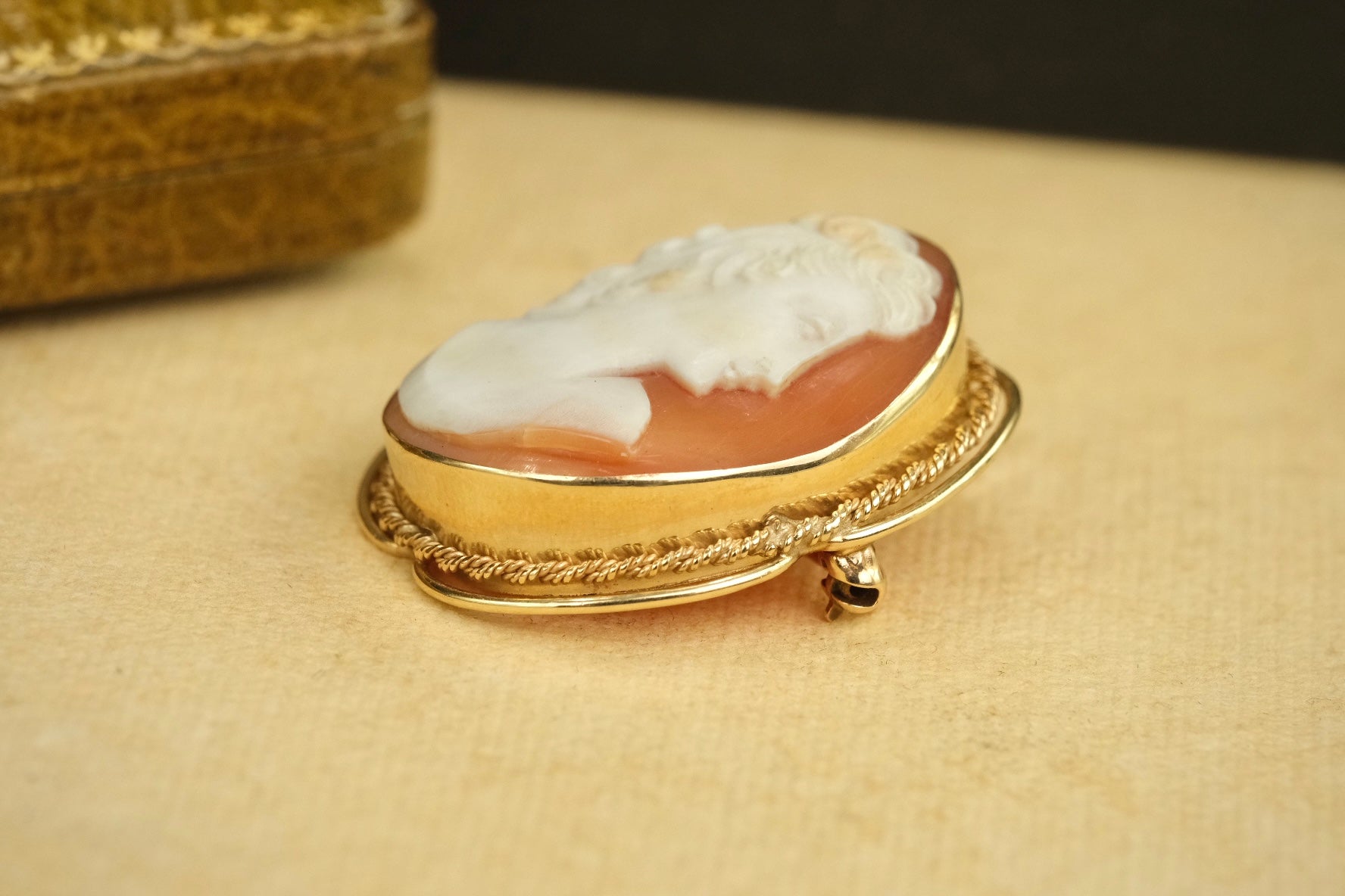 Side profile showing raised cameo setting