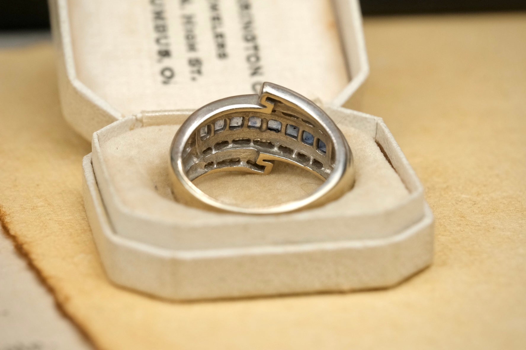 14K gold graduated blue sapphire and diamond bypass ring