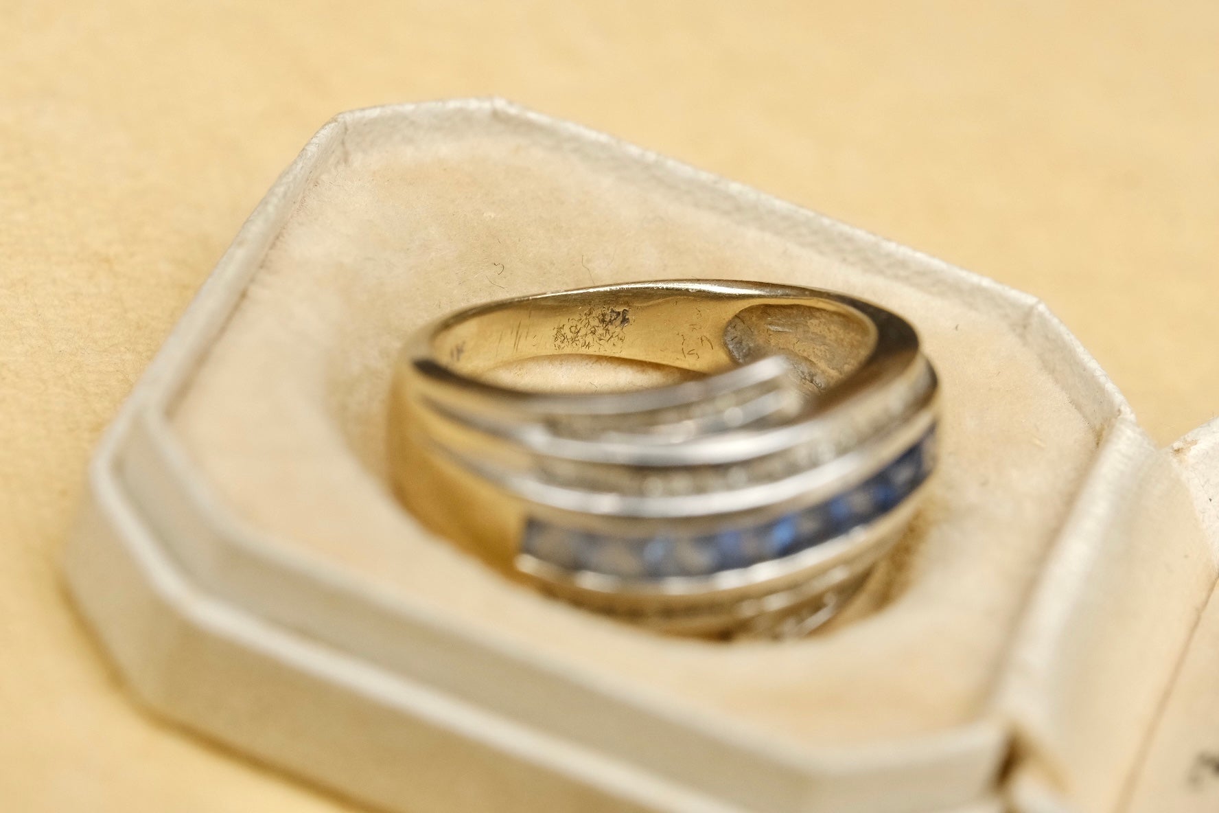 14K gold graduated blue sapphire and diamond bypass ring