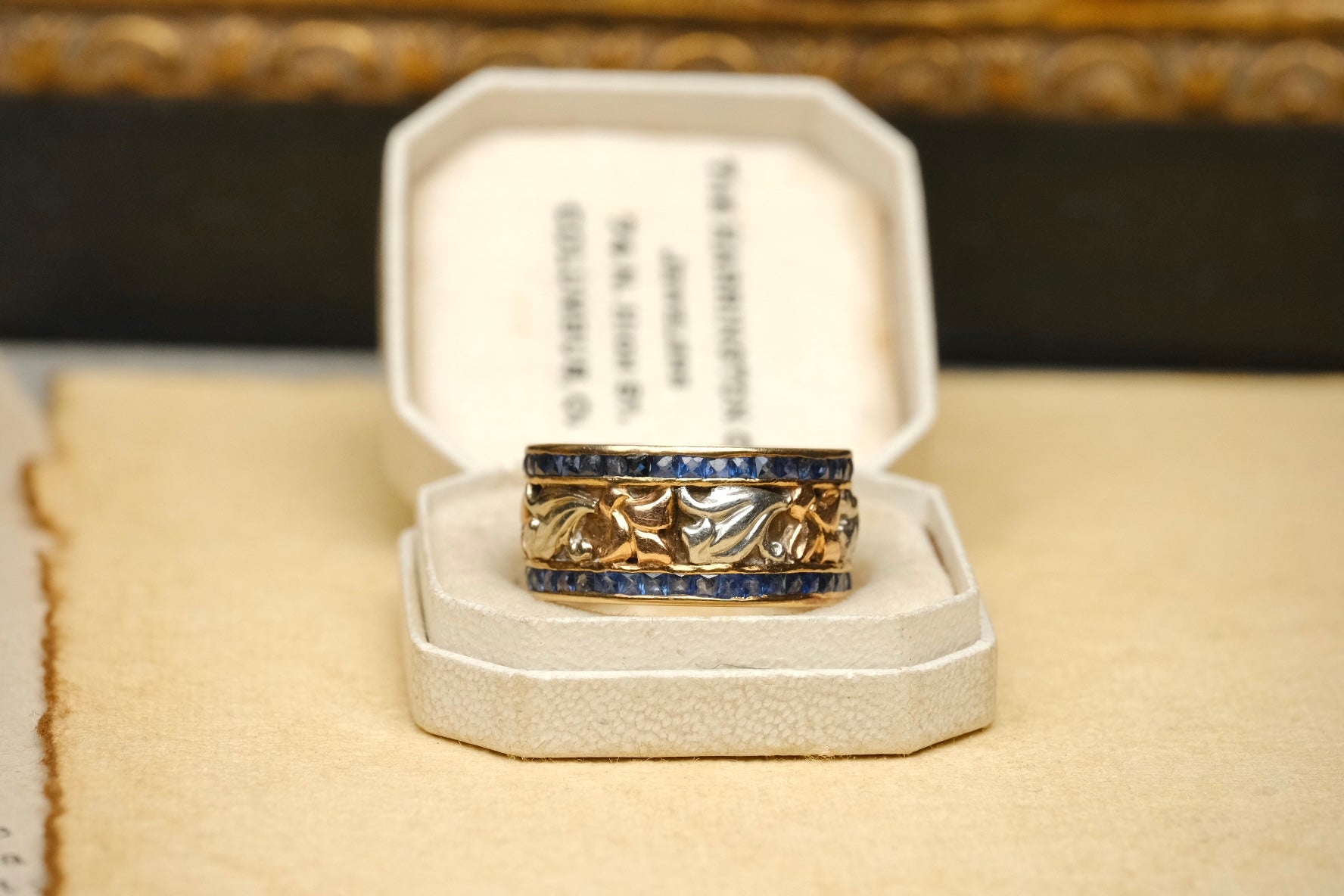 14K two-tone gold sapphire floral eternity band ring