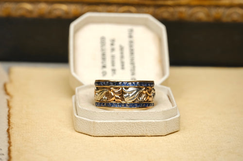 14K two-tone gold sapphire floral eternity band ring
