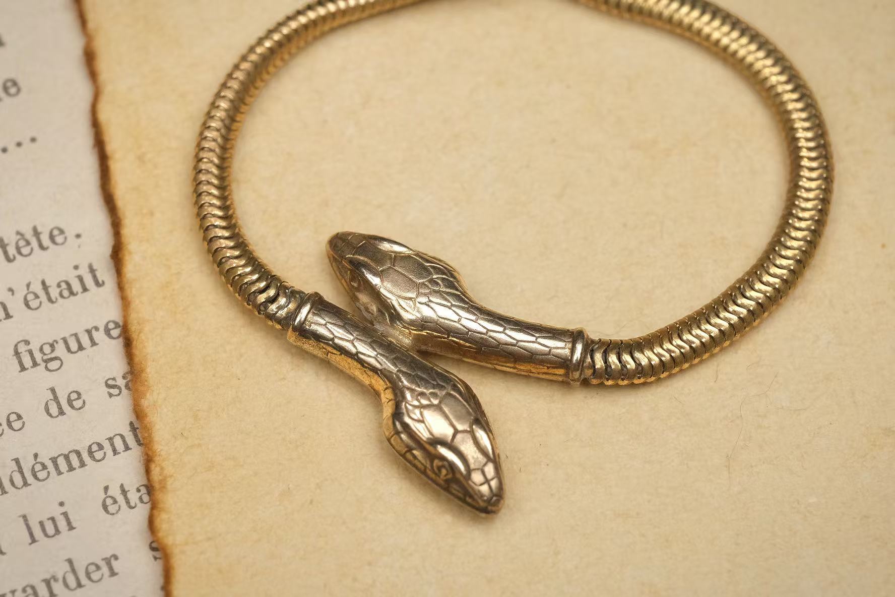 circa 1930s gold-plated double-headed snake necklace snake-head detail