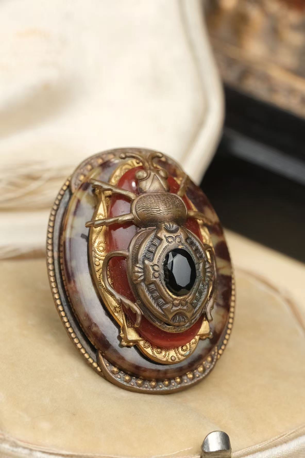 possible Czech or Bohemian Egyptian Revival mottled glass scarab convertible brooch pendant angled front view