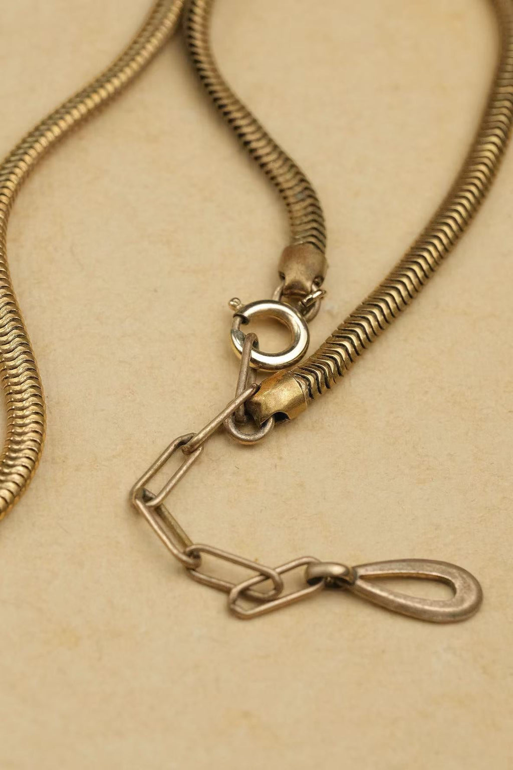 circa 1930s gold-plated double-headed snake necklace clasp and extender detail