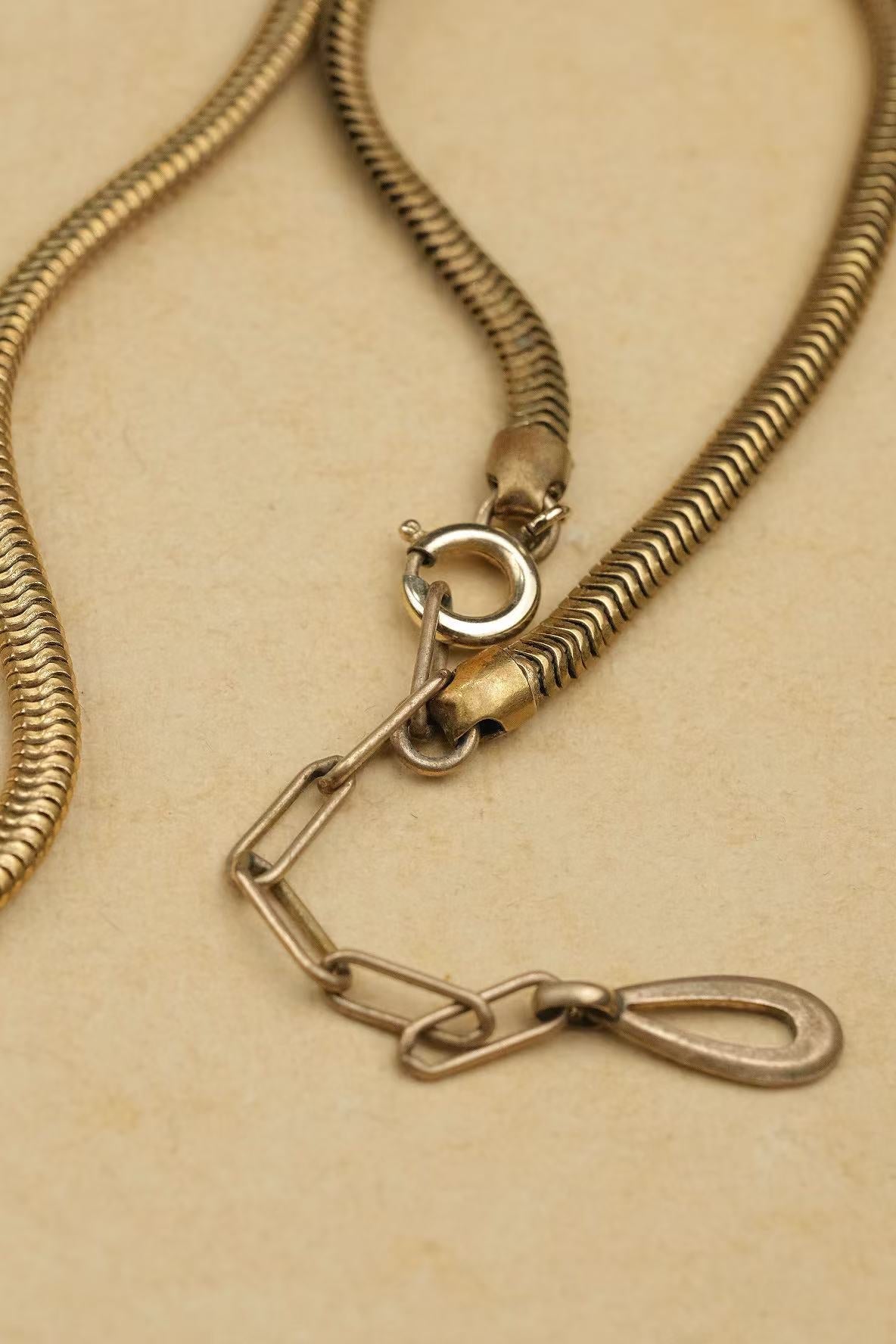 circa 1930s gold-plated double-headed snake necklace clasp and extender detail