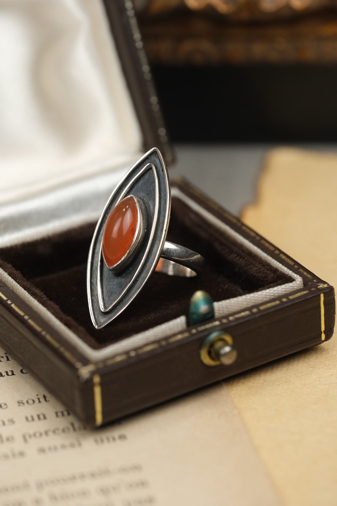 Art Deco 925 sterling silver carnelian Evil Eye ring, angled view