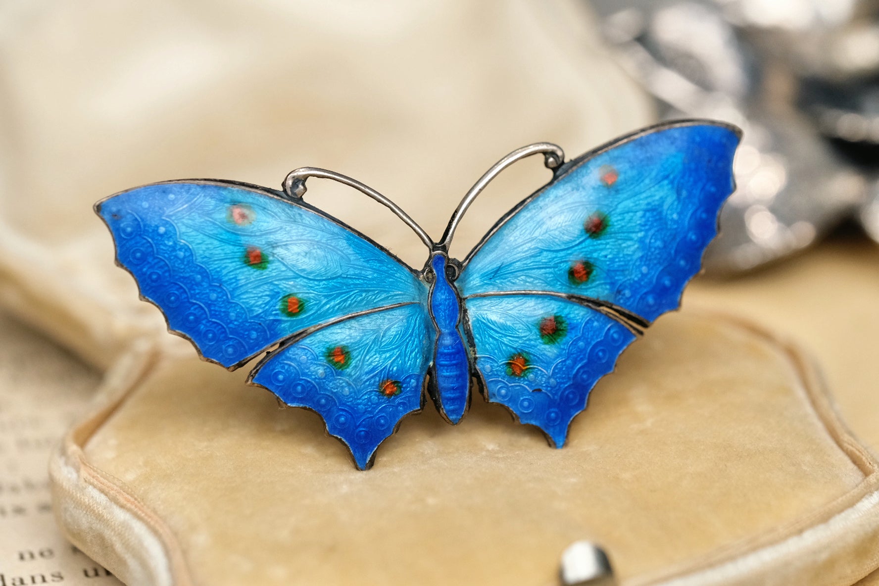 c. 1910 sterling silver enamel peacock-feather butterfly brooch front angled view