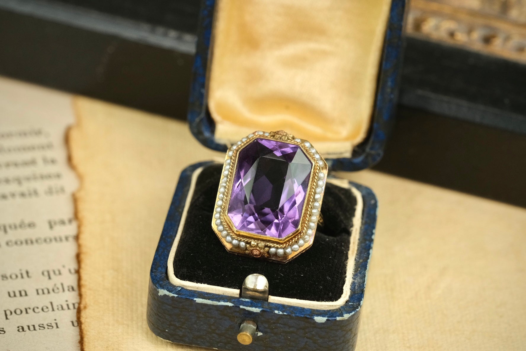 Edwardian 14K amethyst seed pearl ring angled front view