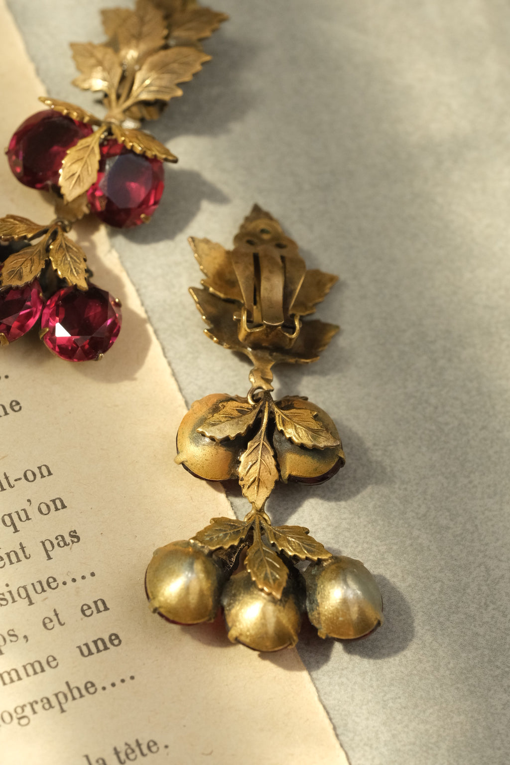 Unsigned clip backs and leaf details on Joseff of Hollywood book-piece earrings