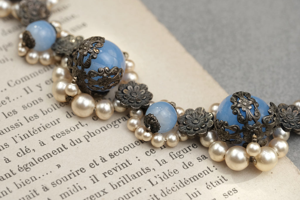 Blue glass pearl necklace floral metalwork detail