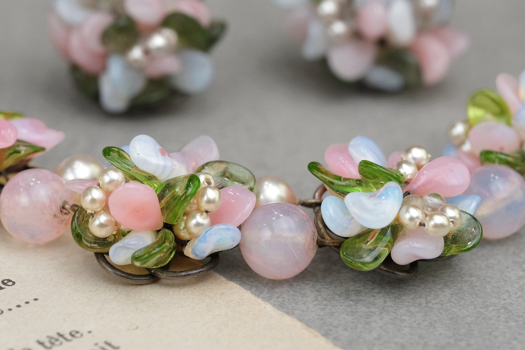 Pastel glass floral necklace with pink glass beads and faux pearls close-up