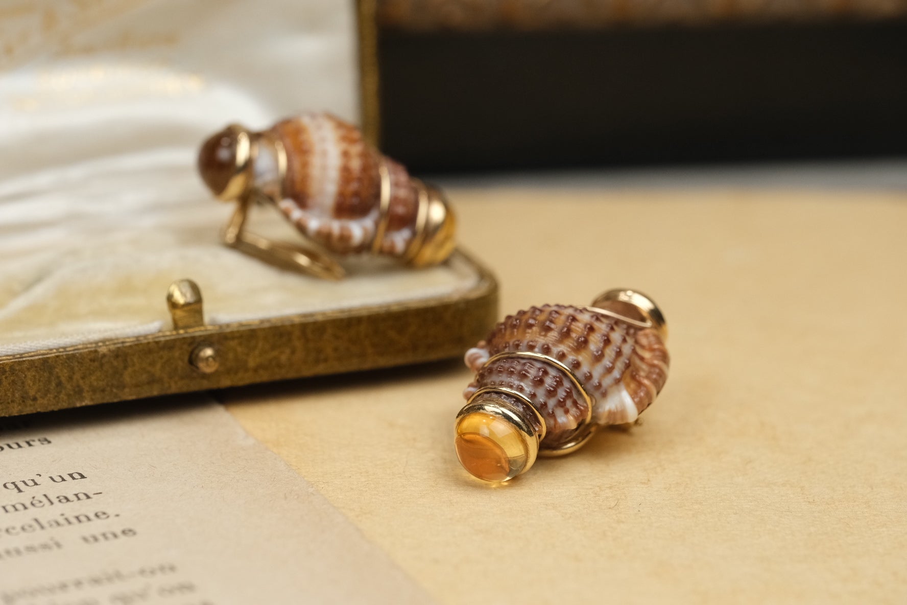 Vintage MAZ Turbo Shell clip-on earring, angled view
