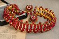 Rare vintage unsigned William DeLillo red glass and rhinestone necklace and clip-on earrings set, full view