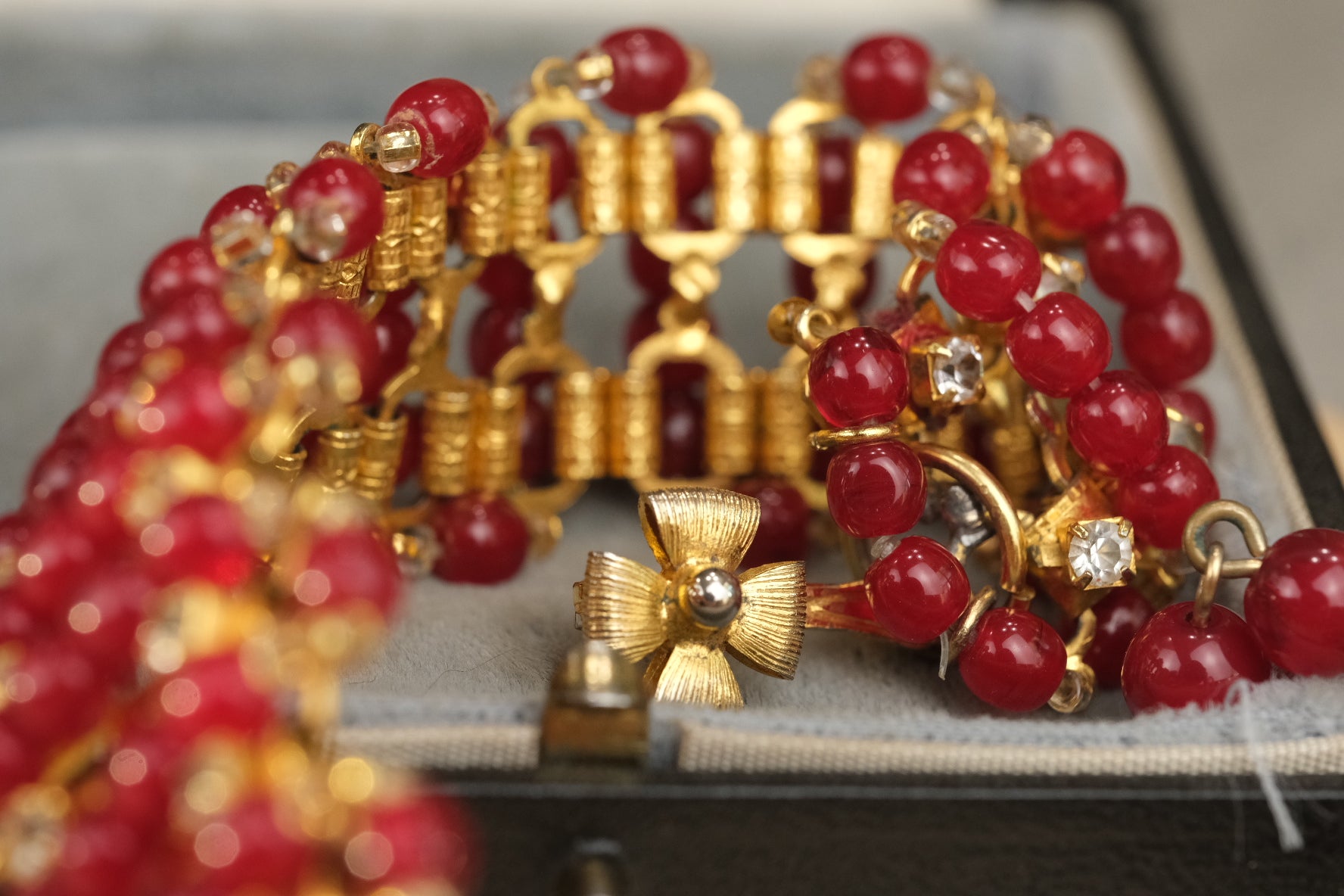 Characteristic four-petal flower clasp on unsigned William DeLillo necklace